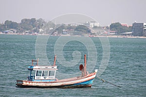 Fishing boat in the sea at fishing port in Thailand