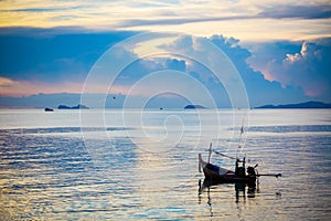 Fishing boat in sea on Koh Samui at amazing sunset