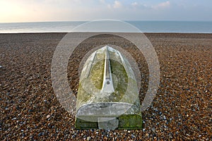 Fishing boat on shingle beach