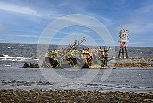 Fishing Boat Shipwreck and Beacon at Cairnbulg, Aberdeenshire, Scotland, UK