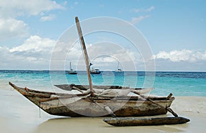 Fishing boat on the shore of Jambiani, Zanzibar, Tanzania, Africa photo