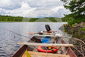 Fishing boat at the shore of the lake. Lake Tagasuk. Krasnoyarsk Territory, Russia