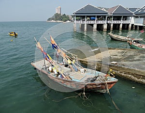 Fishing boat on shore n Angsila bay , Chonburi , Thailand