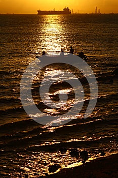 Fishing boat at sunset