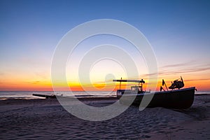 Fishing boat at sunset