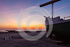 Fishing boat at sunset