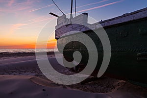 Fishing boat at sunset