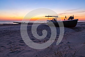 Fishing boat at sunset