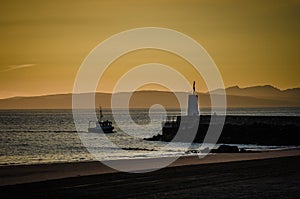 Fishing boat at sunset