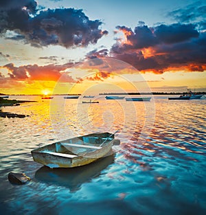 Fishing boat at sunset time.