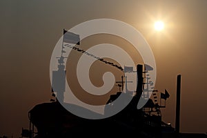 Fishing boat with sunshine are silhouette