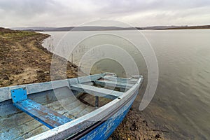 Fishing boat in Ticha dam