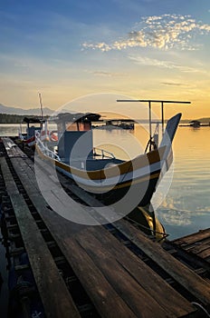 fishing boat at traditional jetty