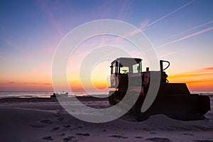 Fishing boat transporter at sunset