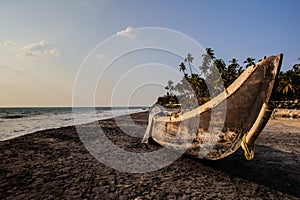 Fishing boat on the tropical beach in Varkala. Kerala. India,