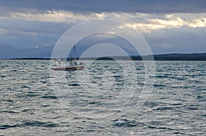 Fishing boat in the Ultima Esperanza Inlet from Puerto Natales.