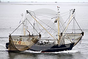 Fishing boat, Waddenzee, The Netherlands photo