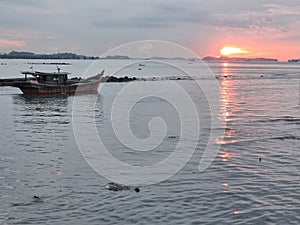 Sunset in Tanjung Uma photo