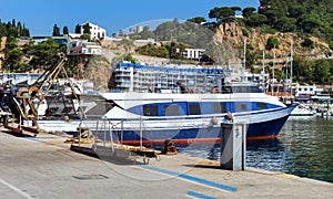 Fishing boat and yachts in port Blanes. Spain