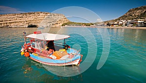 Fishing boats anchored in Matala bay, Crete, Greec