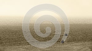 Fishing boats, back to the harbour, sepia hue