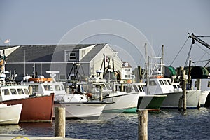 fishing boats in bay harbor marina Montauk New York USA the Hamptons