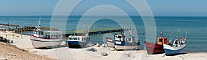 Fishing boats on beach