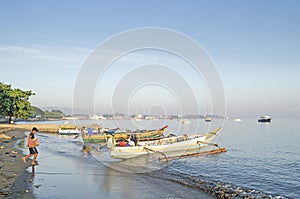 Fishing boats on beach in dili east timor