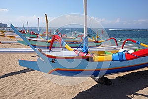 Fishing boats on the beach at Sanur. Bali Indonesia. Asia.