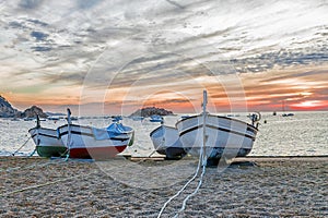 Fishing boats on the beach in Tossa de Mar, Spain