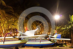 Fishing boats on the beach of tropical island Bali at night, Indonesia.