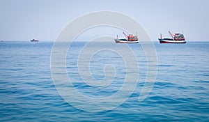 Fishing boats on the blue sea in Koh Chang, Thailand