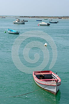 Fishing boats on the Cachucha beach in Puerto Real, Cadiz. Andalusia, Spain.