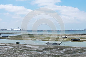 Fishing boats on the coast of the Bay of Puerto Real in Cadiz. Andalusia Spain. June 27, 2021