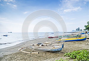 Fishing boats on dili beach east timor photo
