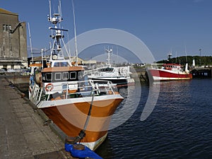 Fishing boats docked in the harbor