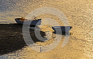 Fishing Boats at evening on a tidal river