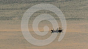 Fishing boats are fishing on ocean
