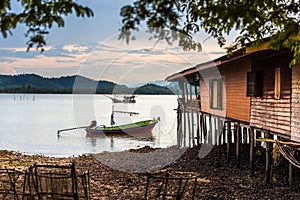 Fishing boats and fishing village sunset