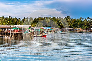 Fishing boats and fishing village sunset