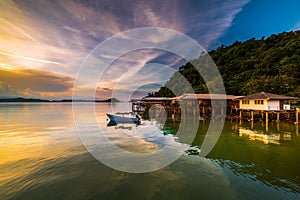 Fishing boats and fishing village sunset