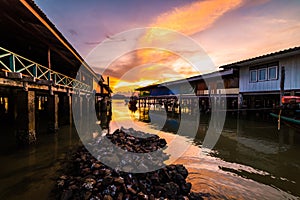 Fishing boats and fishing village sunset