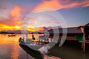 Fishing boats and fishing village sunset