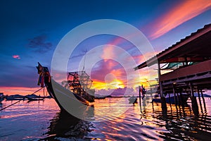 Fishing boats and fishing village sunset