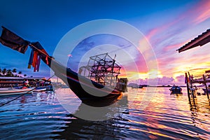 Fishing boats and fishing village sunset