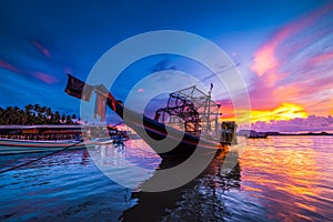 Fishing boats and fishing village sunset