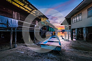 Fishing boats and fishing village sunset