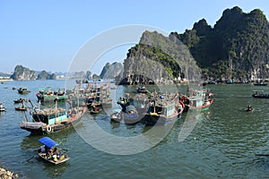 Fishing boats in Halong Bay, Vietnam photo