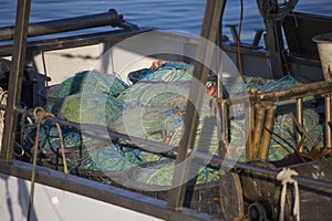 Fishing boats in harbor - fishing nets