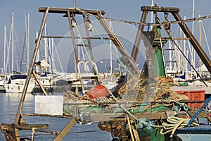 Fishing boats in harbor - fishing nets